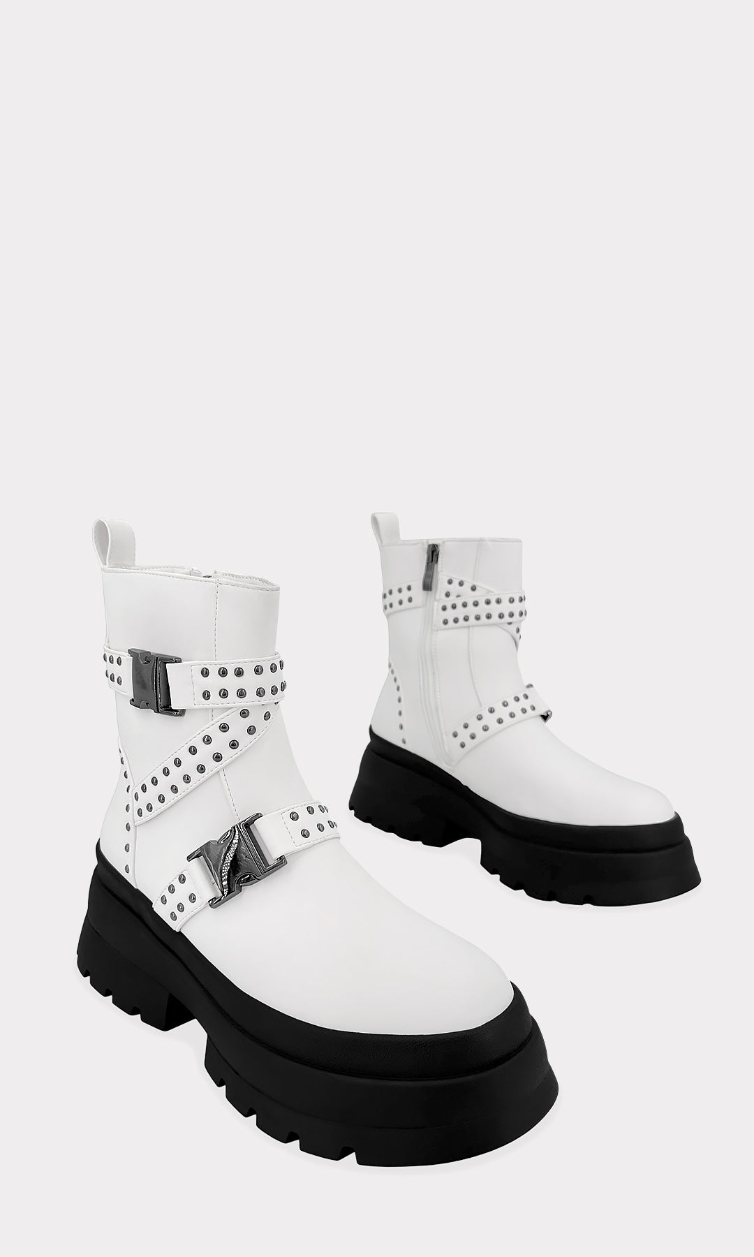 FORCE BOTINES BLANCOS CON SUELA DENTADA GRUESA HECHAS EN NUBUCK CON DOS HEBILLAS DE LIBERACION EN CINTAS DELGADAS Y TACON BAJO DE 6.5 CM PARA MUJER