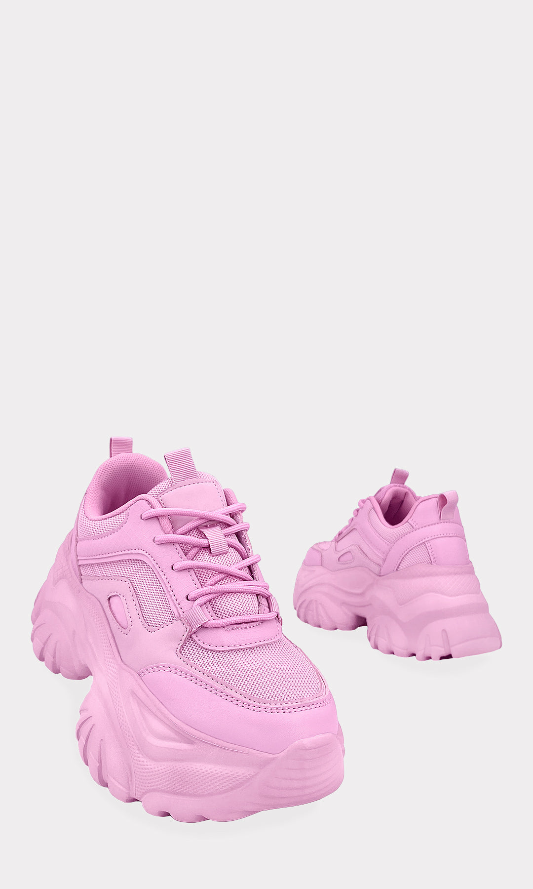 LIAN TENIS ROSAS CONFECCIONADOS EN VINIPIEL CON DETALLES DE MALLA TRANSPIRABLE Y PLATAFORMA CHUNKY PARA USAR EN STREET STYLE LOOK