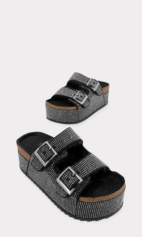 LINETTE SANDALIAS NEGRAS CHUNKY DE SUELA DENTADA CON PLATAFORMA XL Y DOS HEBILLAS METALICAS EN STRAPS AL FRENTE PARA MUJER